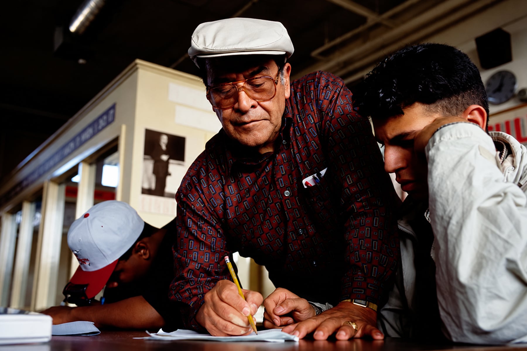 Jaime Escalante helping students with their work