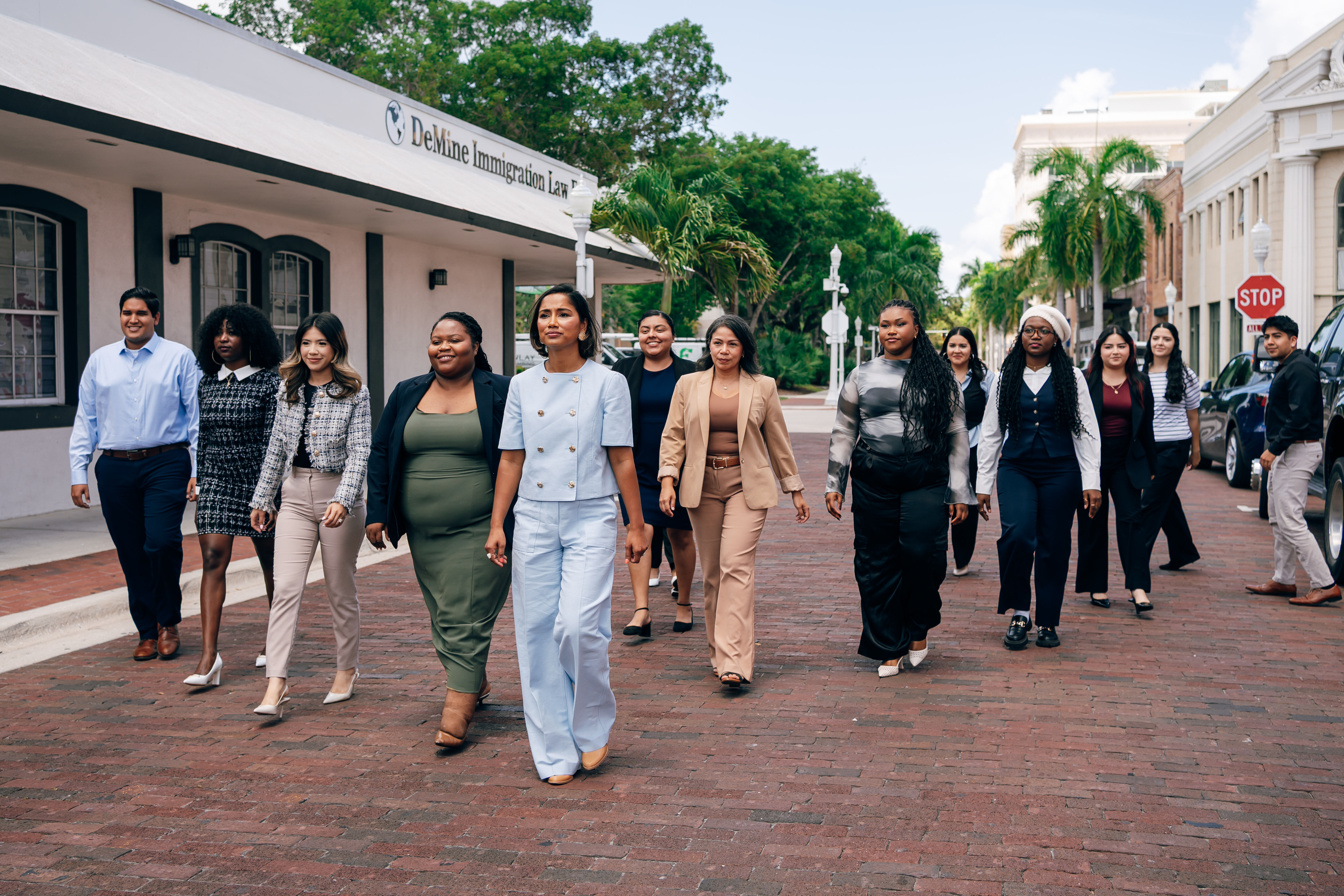 The DeMine Immigration team walking through downtown Fort Myers